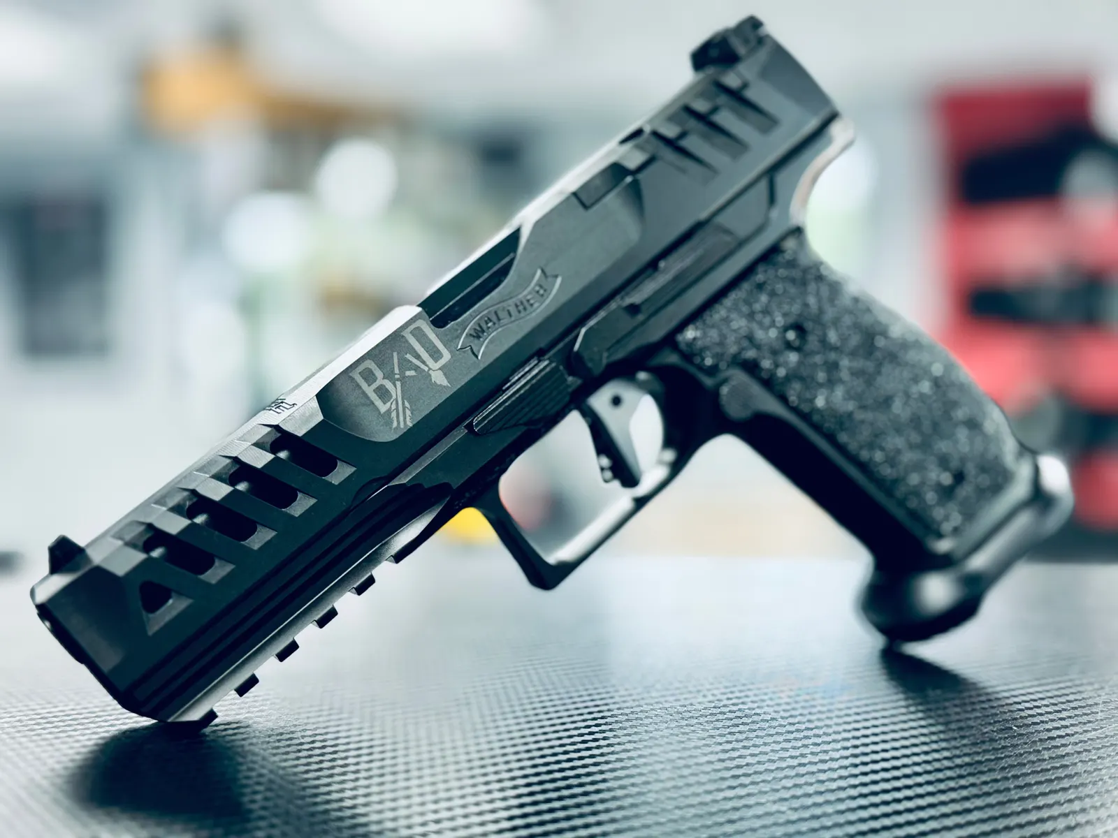 Milled slide with lightening cuts